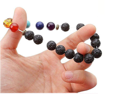 Pulsera de los 7 chakras en piedras de lava natural.